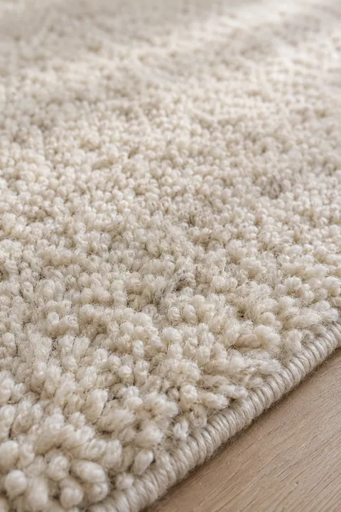 Close detail of short wool rug tufts