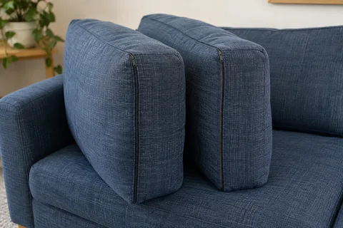 Fabric sofa cushions with visible seams