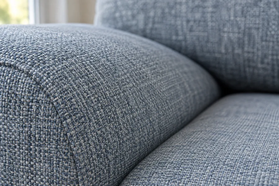 Close view of woven upholstery fabric on a sofa