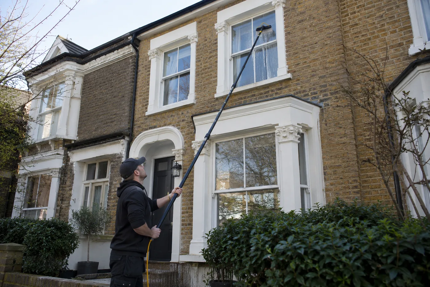 Illustrative image: Window-cleaning pole used from ground level
