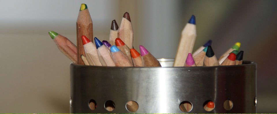 pencils in a container, let your gather all pencils and arrange them